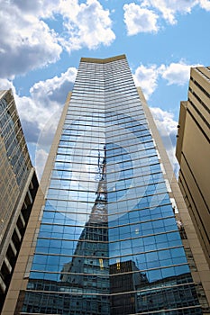 Sao Paulo Modern High Skyscraper. Glass Business Centre In The Paulista Avenue. Sky Clouds Reflection On The Mirror Wall.