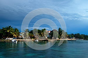 Saona Island coast with hotels view from water photo