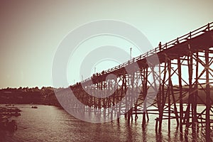 Saphan Mon wooden bridge across the river in Sangkhlaburi District, Kanchanaburi Thailand,vintage theme