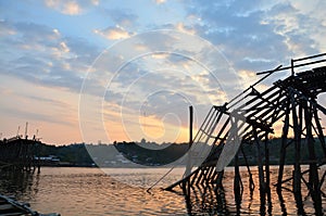 Saphan Mon wooden bridge Broken at sunset time