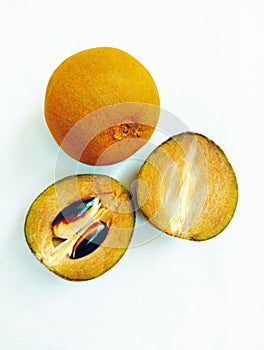 Sapodilla fruit sapota plantfruit food sapoche, manilkara zapota, sapotille, sapote, sapoti chicozapote, chico, chicle photo