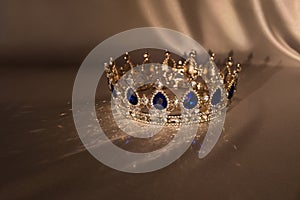 Sapphire vintage crown. Symbol of success, monarchy and wealth