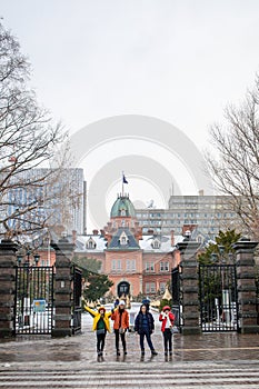 Unidentitied tourist with Beautiful architecture from in front of former Hokkaido government office building