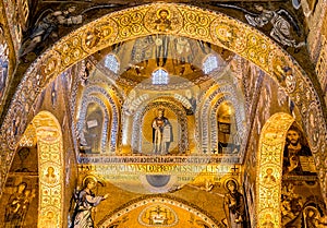 Saracen arches and Byzantine mosaics within Palatine Chapel of the Royal Palace in Palermo photo