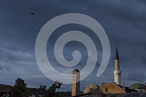 Sarajevo clock tower and minaret of Gazi Husrev bey mosque with taslihan remains and roof of bezistan