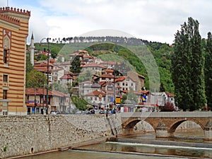 Sarajevo Old Town and the Seher-cehajina Bridge over Miljacka River, Sarajevo, Bosnia and Herzegovina on May 2nd 2016 photo