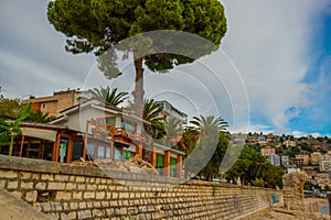 SARANDA, ALBANIA: Beautiful palm trees on the embankment in Saranda.