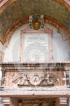 Sarcophagus of the Abbots - Sarcofago degli Abati - on the external faÃ§ade of the little church of Sant`Apollinare, Trento, Tren