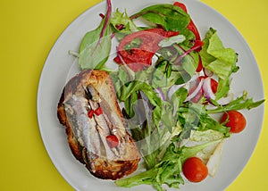 Sardines on toast with chili and salad