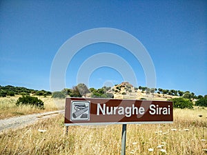 Sardinia. Carbonia. Nuraghe Sirai. Touristic signal at entrance of the nuragic archeological area