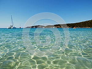 Italy, Sardinia, Porto Budello, Teulada, view of the bay, in the background the medi vegetation, in the background rocky mountains