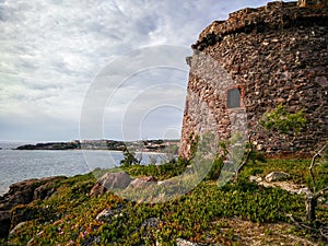 Sardinia. Portoscuso. Sa Turri and the Portupalleddu harbour photo