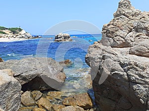 Sardinia , Punta di Santa Giusta, beach and rocks 5 photo