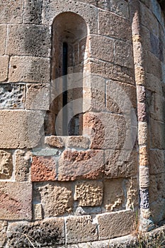 Sardinia. San Giovanni Suergiu. Palmas. Ancient Church of Santa Maria di Palmas, 11th century AD. Single lancet window of apse photo