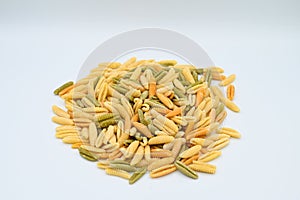 Sardinian gnocchetti pasta, also known as malloreddus or macarrones de punzu, isolated on a white background photo