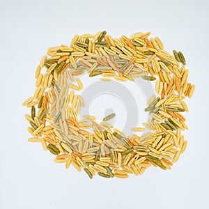 Sardinian gnocchetti pasta, also known as malloreddus or macarrones de punzu, isolated on a white background photo