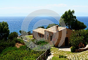 Sardinian home overlooking sea photo