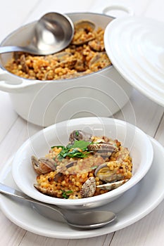 Sardinian pasta fregula with clams, italian cuisine