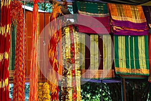 Sarees for religious offering at a temple, holy threads, headbands for sale