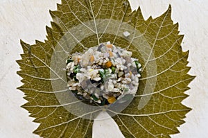 Sarma or dolma - Rice wrapped in grape leaves photo