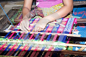 Sasak tribe lady weaving, Lombok