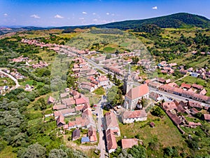 Saschiz saxon village in Transylvania, Romania aerial view