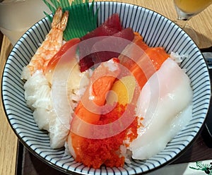 Sashimi on a bowl of rice