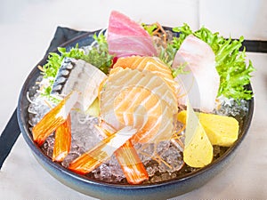 Sashimi mix consists of Salmon, Izumidai, Kanikama, Maguro, Shime-saba and Tamago