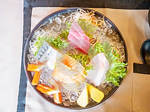 Sashimi mix consists of Salmon, Izumidai, Kanikama, Maguro, Shime-saba and Tamago