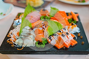 Sashimi Salmon Tuna Hamachi Prawn and Surf Calm set, raw fish, japanese food in Asian restaurant