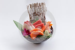 Sashimi Set Include Raw Salmon, Raw Hamachi Japanese Amberjack, Raw Maguro Bluefin Tuna and Kani Crab Stick. photo