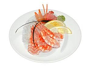 Sashimi set with shrimps on white round plate