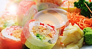 Sashimi sushi in close up picture. Shrimps with rice and parsley in close-up image. Plate of seafood. Fresh and delicious maki and