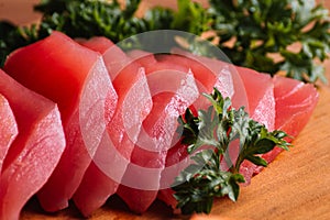 sashimi of tuna in wood table