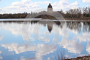 Saskatchewan Legislature building reflected bright sky Wascana Lake