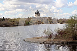 Saskatchewan Legislature building reflected bright sky Wascana Lake