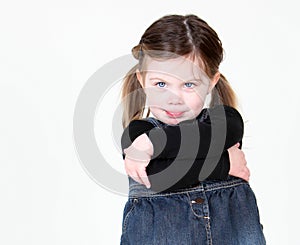 Sassy child with arms folded