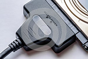 Sata cable connected to hdd 2.5 hard drive disk closeup view