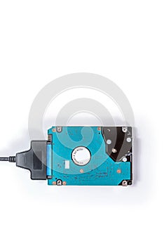 Sata cable connected to hdd 2.5 hard drive disk on white background closeup view