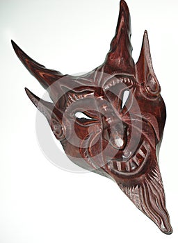 Satanic mask wooden photo