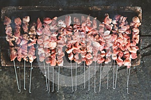 Sate Klatak grilling on charcoal grill. Sate klathak is a unique goat satay or mutton satay dish, originally from Yogyakarta,