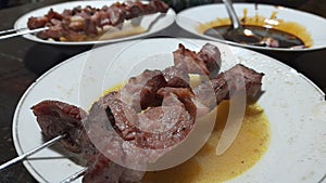 Sate klathak or lamb barbeque from Jogjakarta served in a white plate