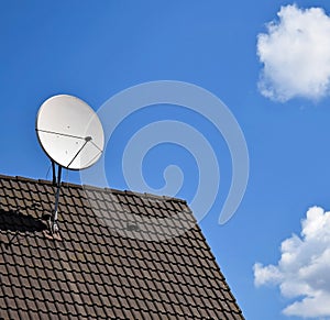 Satellit dish on the top of a roof