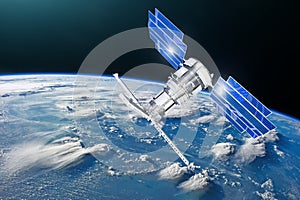 Satellite above the Earth makes measurements of the weather parameters. Sensing, research, probing, monitoring of in atmosphere El