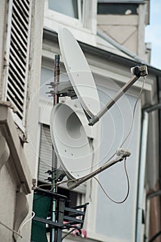 satellite antena on home facade on balcony