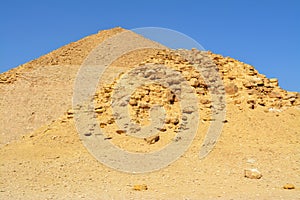 The satellite and the bent pyramids, Satellite one is located 55 meters south to the bent pyramid of king Sneferu, 26 meters in