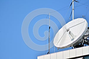 Satellite Communications Dishes on top of TV Station.