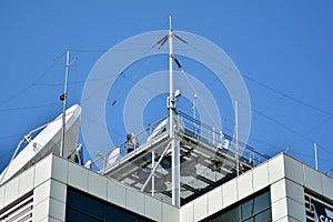 Satellite Communications Dishes on top of TV Station.