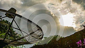 Satellite dish antenna and cloudy sky