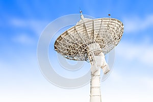 satellite dish antenna radar big size isolated on blue sky background